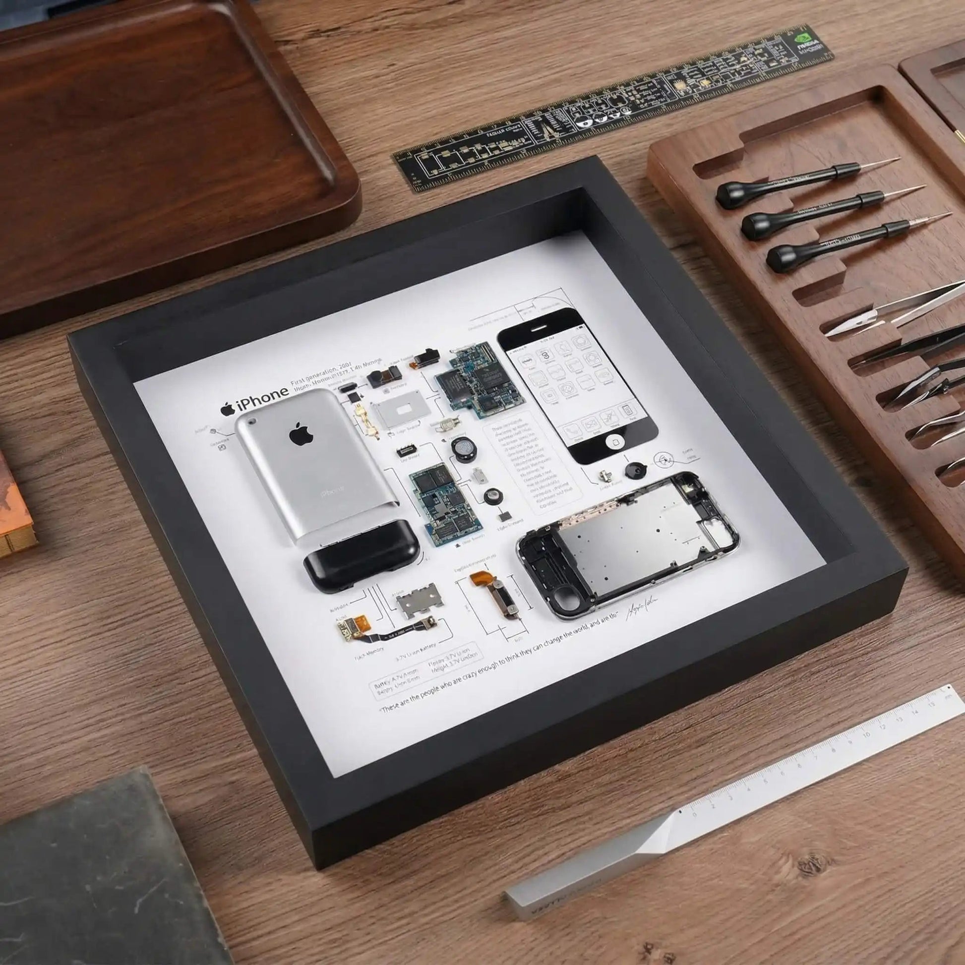 iPhone 1st gen teardown frame on desk, minimalist tech wall decor for office or studio